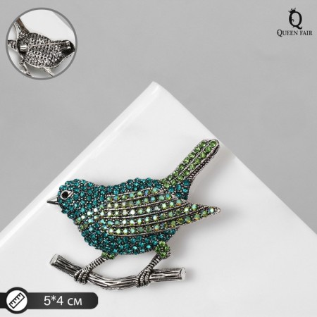 Brooch "Bird" thrush, green color in black gray metal