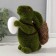 Souvenir Foam "Rabbit green with an testicle and a basket with carrots" 15x7x15.5 cm