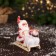 Santa Claus "In a suit with patterns and fur shoes, on a sleigh" 13 cm, red-white