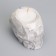 Candle "Skull" in a candlestick of gypsum with faces, 6x9x6.5cm, marble with black stripes