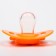 Silicone orthodontic dummy with a holder and cap, from 0 months, color orange
