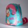 Baby backpack on a zipper, a reflective strip, pink/turquoise color