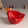 Ceramics stand "Elk in a green fur coat with a large red bag" 12.5x19.1x13.1 cm