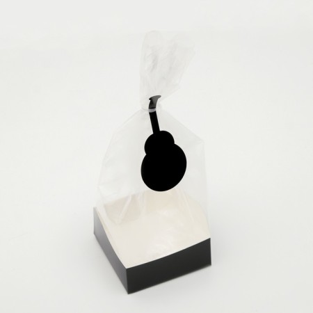 A package with a hard bottom, black, 10 x 10 x 32 cm-1