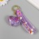 A keychain plastic with a carbine, a strap "Heart with flowers" Water with a decor 5x5x2.5 cm