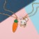 Kulons "Demetrons" Carrots with a hare, white-orange color in gold, 45 cm