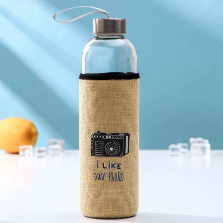 A glass bottle in a “Voyage” cover, 750 ml, h = 25 cm, color mix