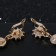 Hanging earrings with “evening” rhinestones, white-blue color in gold, 7 cm