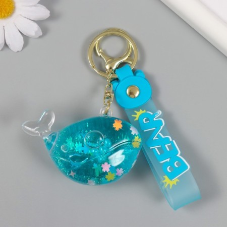 A plastic keychain with a carbine, a whale strap of water with sparkles 4x7x2.5 cm-1