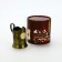 The cup holder "Golden Man", 12.5 x 8.5 x 11.3 cm