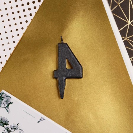 Candle for the cake, number "4", black.