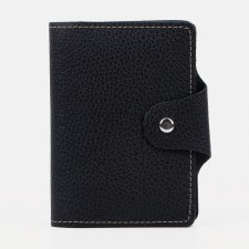The cover on the button, for auto documents and passports, black color