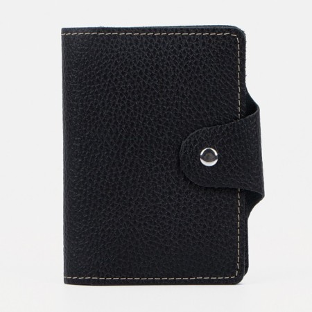 The cover on the button, for auto documents and passports, black color