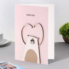 A postcard with a wooden element 