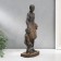 Polystone souvenir "African with son" under a tree 32x15.5x9 cm