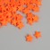 Decor for creativity plastic "Stars" neon orange set 50 pcs 1.4x1.4 cm