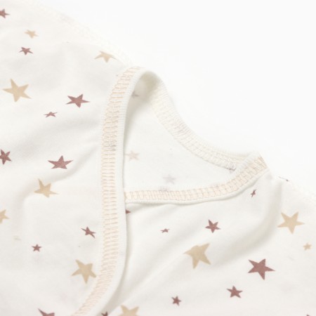 A set for newborns (swing/slider/cap), white/stars, height 62-1