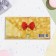 Money envelope "Universal" red bow in gold, 16.5 x 8.5 cm
