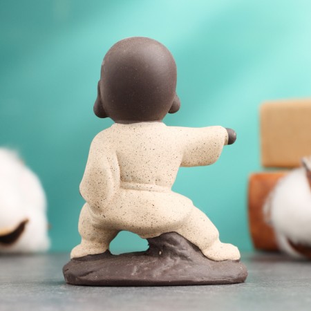 Figure "Buddha Karatist", 7x9 cm, yellow-9