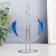 Dolphins pendulum one after another with a ring of 6.5 x 6.5 x 14 cm