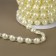 Pearls on threads, flat, 10 mm, 9 ± 1 m, milk color