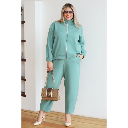 Female suit, size 54, the color is light green