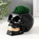Concrete Kashpo "Skull Money" with moss 7x11 cm black with golden teeth (moss green stabil)