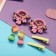 Set for hair "Tiny" (4 clamps, 4 crab) is a bright unicorn, mix