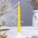 Candle twisted, 2.2x 25 cm, varnished yellow