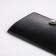 Passport cover on the button, black color