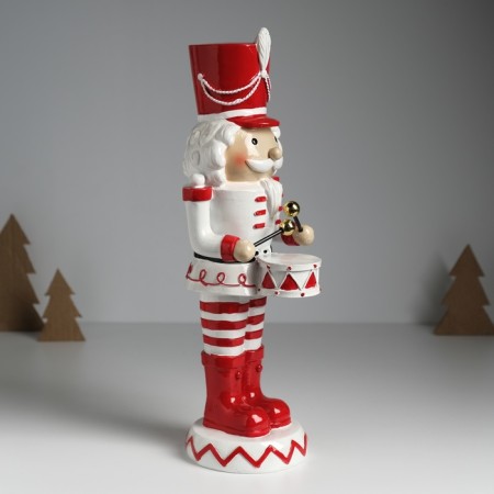 Polystone souvenir "Nutcracker with curls in a red-white uniform, with a drum" 11x11x32 cm 1032587-2