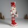 Polystone souvenir "Nutcracker with curls in a red-white uniform, with a drum" 11x11x32 cm 1032587