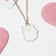 Children's pendant "chosen" bear cub, white color in gold