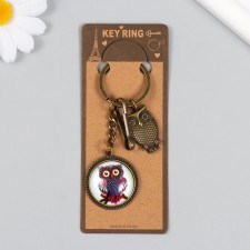 Metal keychain, glass with a carbine 