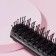 The comb is massage, ventilated, 4 × 23.2 cm, black/white color