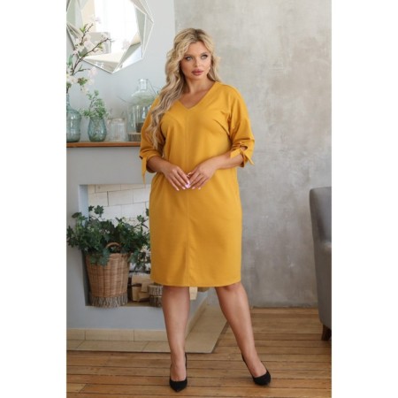 Female dress, size 50, mustard color