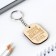 A wooden key key, a “beloved husband” token 3.5 x 4.5 cm
