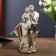 Polystone souvenir "In love pair on a brick hedge" 22x14.5x8 cm