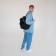 City backpack, textura made of artificial leather with zipper, outer pocket, black color
