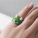 Ring "Montrustrik" with horns and eye, the color is green, dimensionless