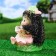 Garden figure "Hedgehog with a book" 25x17cm