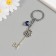 Keychain from the evil eye Metal "key with a lion" 2.5x6.2 cm