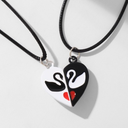 Kuulons "Uzolnutor" on the magnet, swans in the heart, black and white color, 40 cm