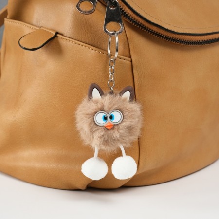 Fluffy on the ring "oblique eyes" brown 9.5x6x6 cm
