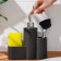 A dispenser for a detergent with a stand for the sponge and brushes “minimum”, 350 ml, the color of a dark brown