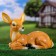 Garden figure "Lying Olenienok" from the polystone good souvenirs, 37cm, medium, brown