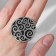 Ring of "ethnic" patterned circle, color black silver, dimensionless