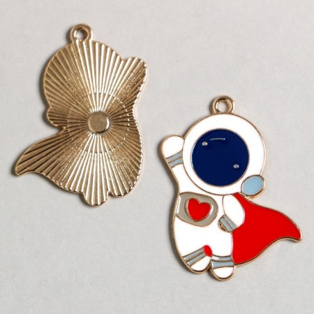 Decor for creativity metal, enamel "Cosmonaut in a red cloak" gold 3.1x2.5 cm