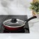 The “Expert” pan, d = 20 cm, plastic handle, glass cover, anti -stick coating, burgundy color
