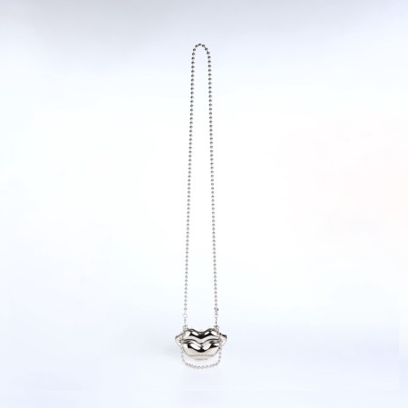Female bag on a magnet, silver color